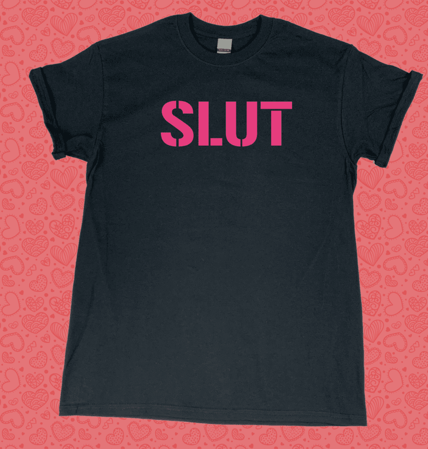 A black t-shirt with the word slut written in pink.